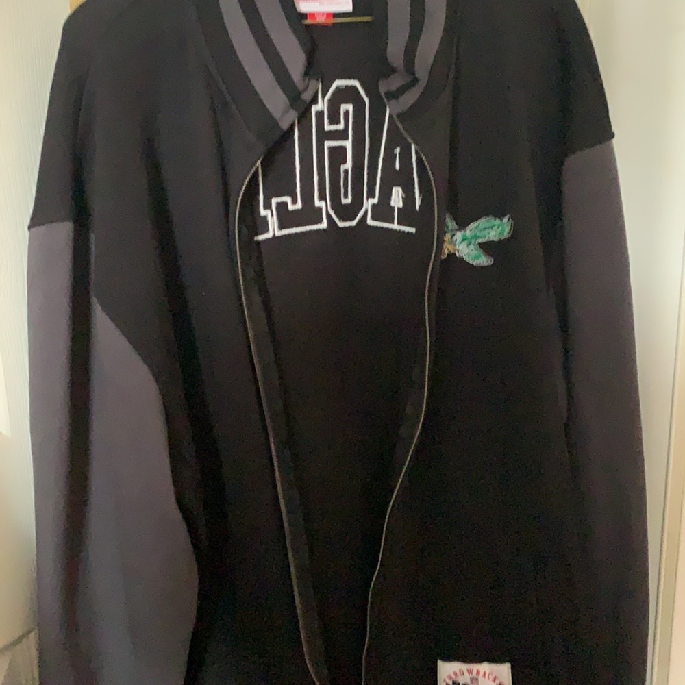 Sold Eagles Zipper up sweater brand new.